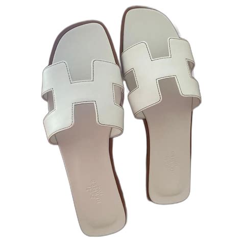 hermes slippers white|hermes slippers white price.